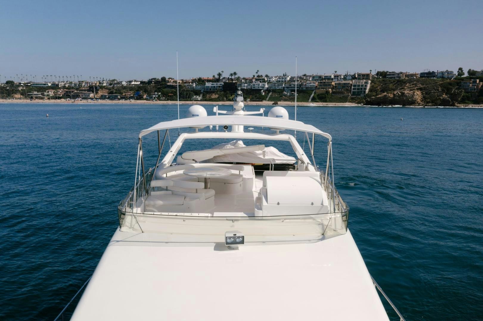 a white boat in the water aboard LIVING LIFE Yacht for Sale
