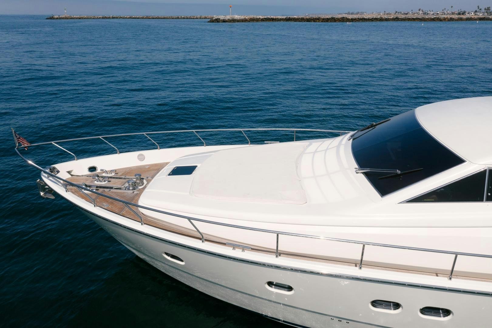 a white boat in the water aboard LIVING LIFE Yacht for Sale