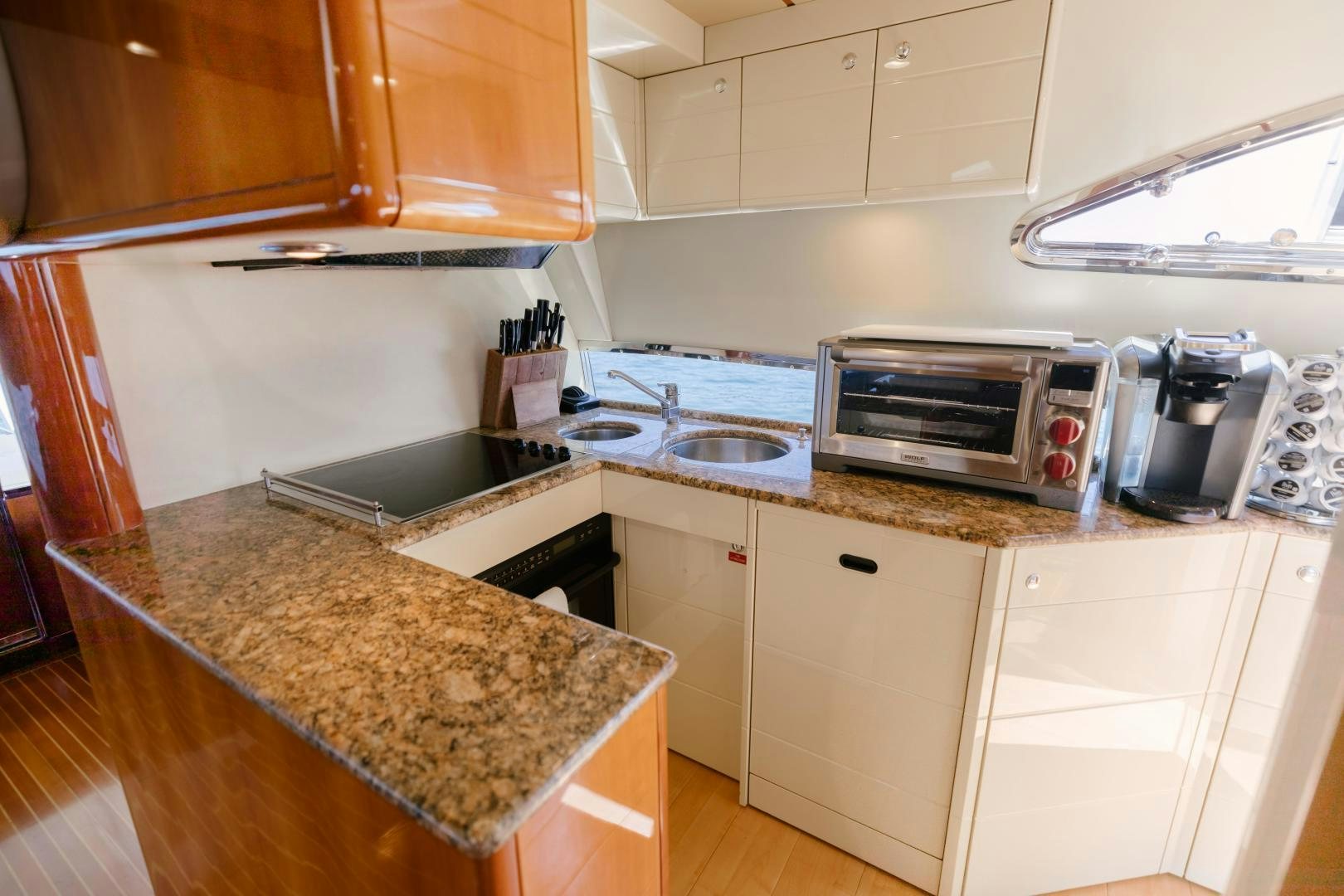 a kitchen with a microwave oven aboard LIVING LIFE Yacht for Sale