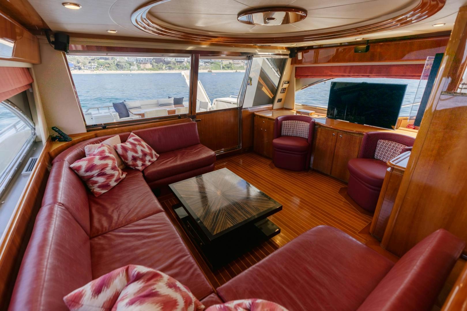 a train with a table and chairs aboard LIVING LIFE Yacht for Sale