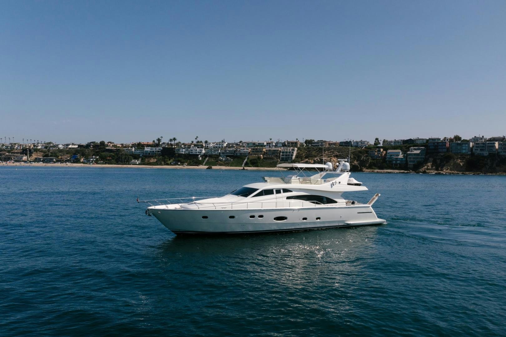 a white yacht in the water aboard LIVING LIFE Yacht for Sale