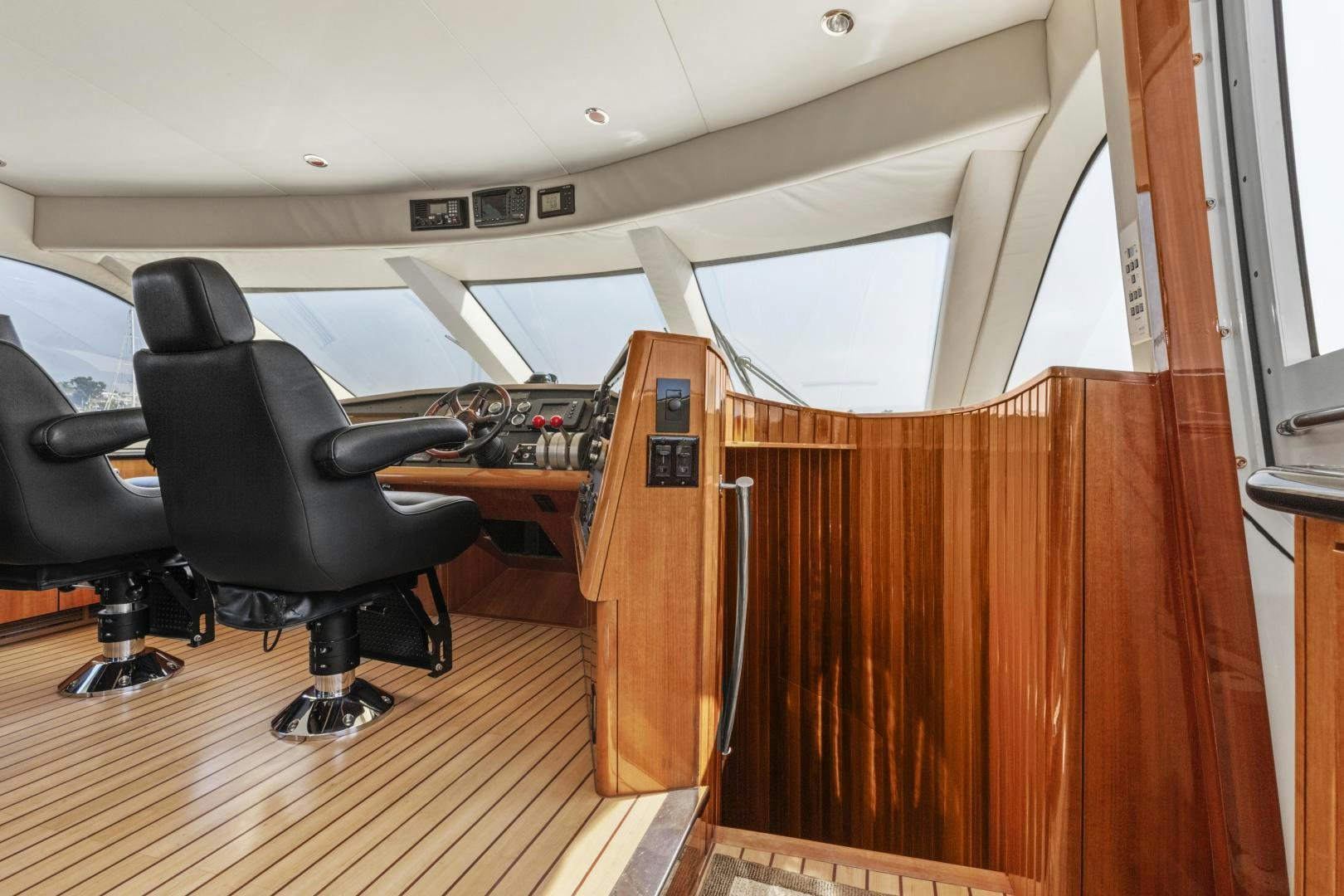 a room with a chair and desk aboard RILASSARI Yacht for Sale