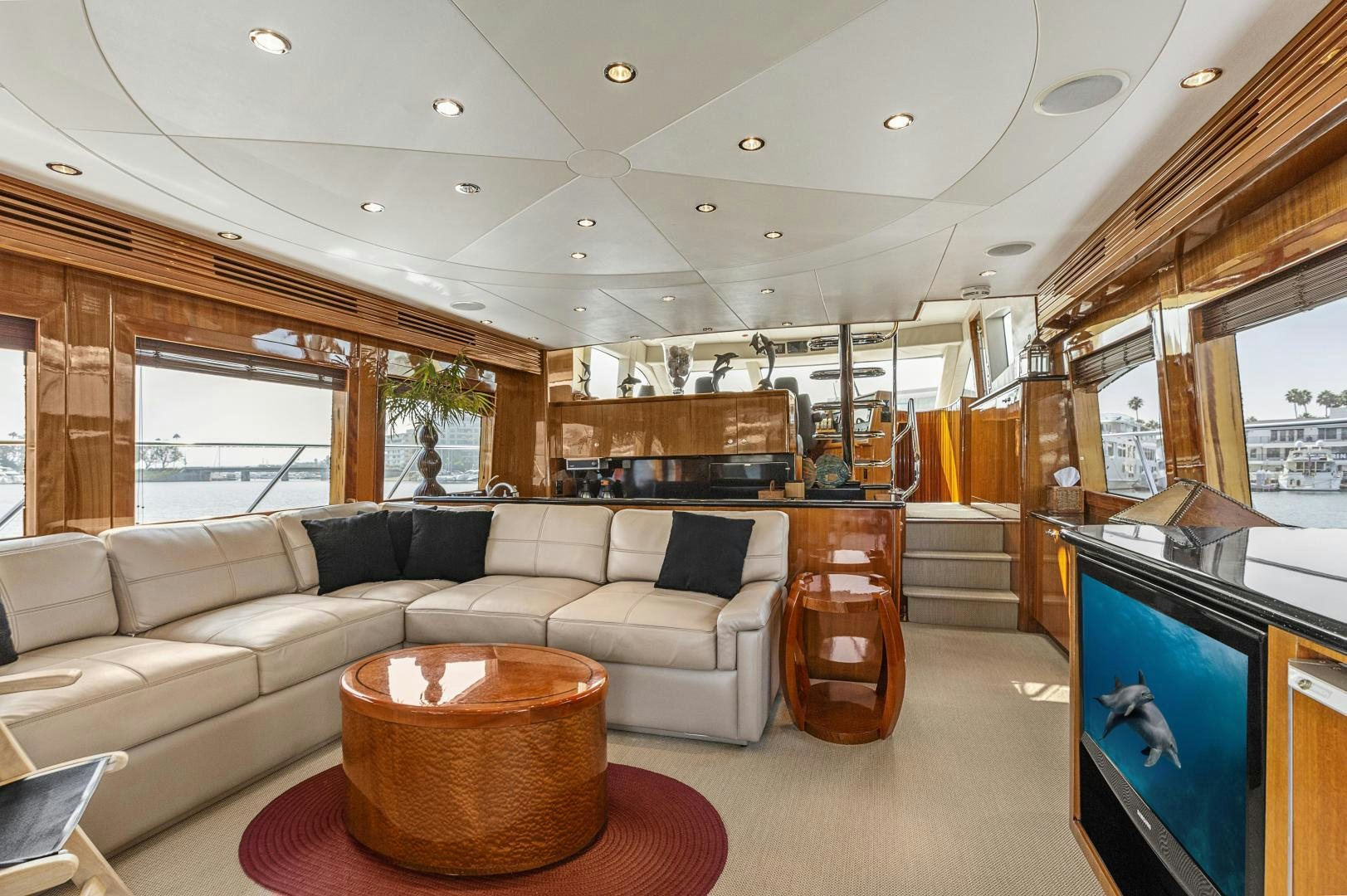 a living room with a couch and a coffee table aboard RILASSARI Yacht for Sale