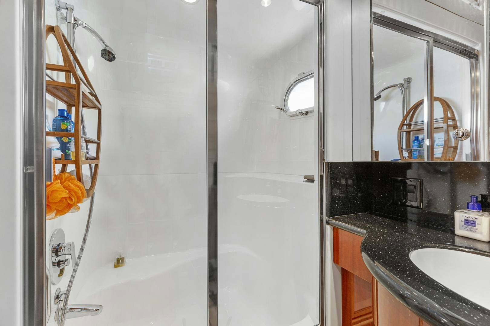 a shower unit next to a sink aboard RILASSARI Yacht for Sale