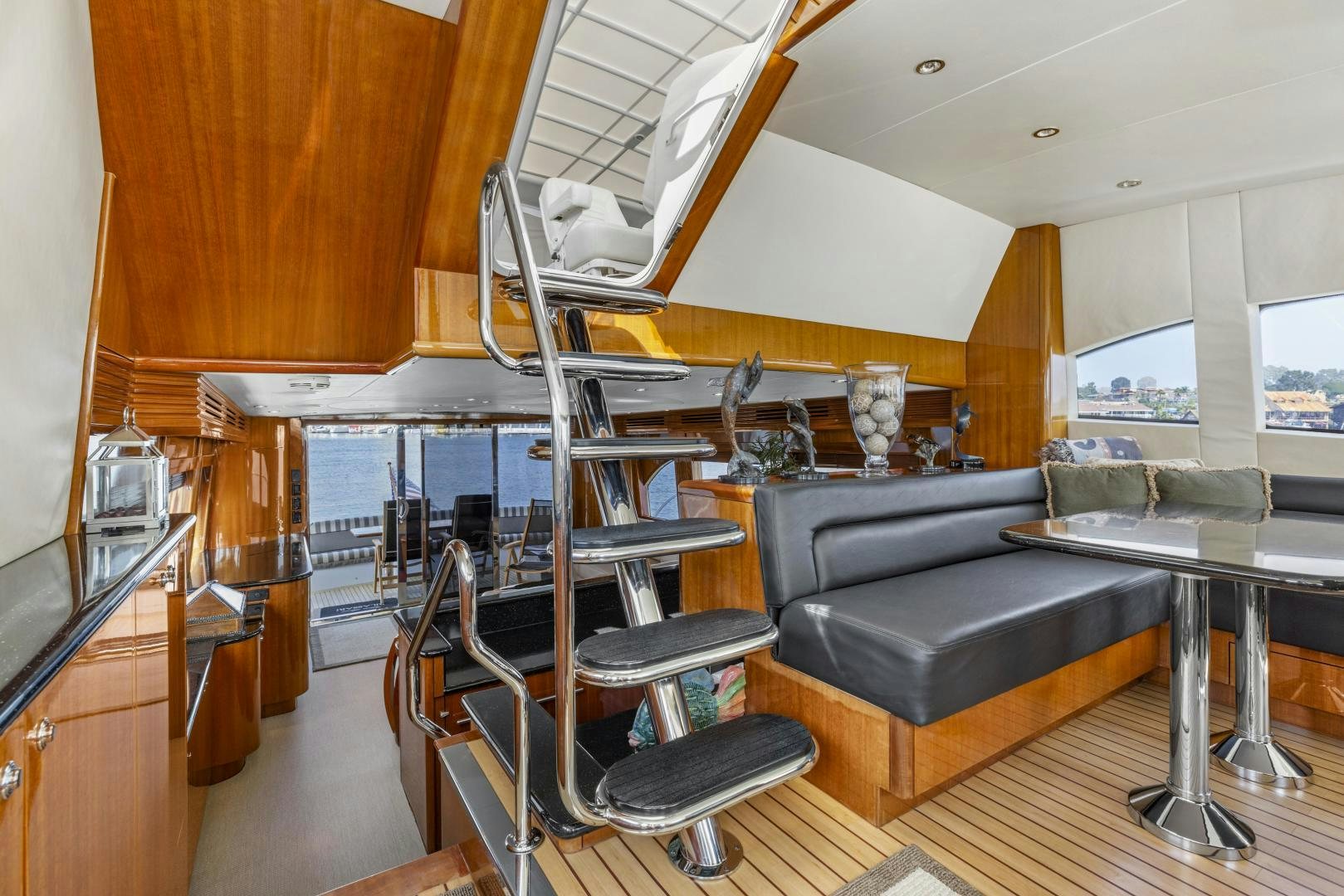 a room with a couch and a table aboard RILASSARI Yacht for Sale