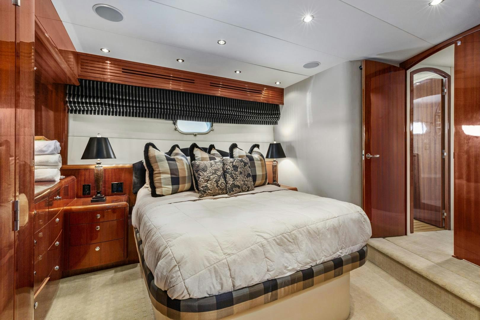 a bed in a room aboard RILASSARI Yacht for Sale