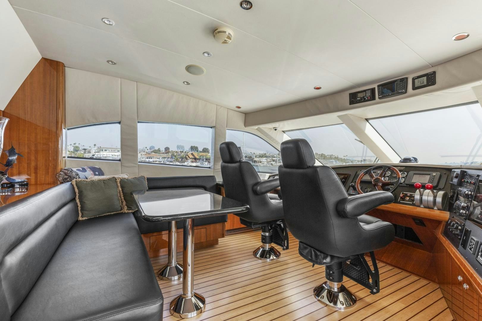 a room with a couch and a table and a tv aboard RILASSARI Yacht for Sale