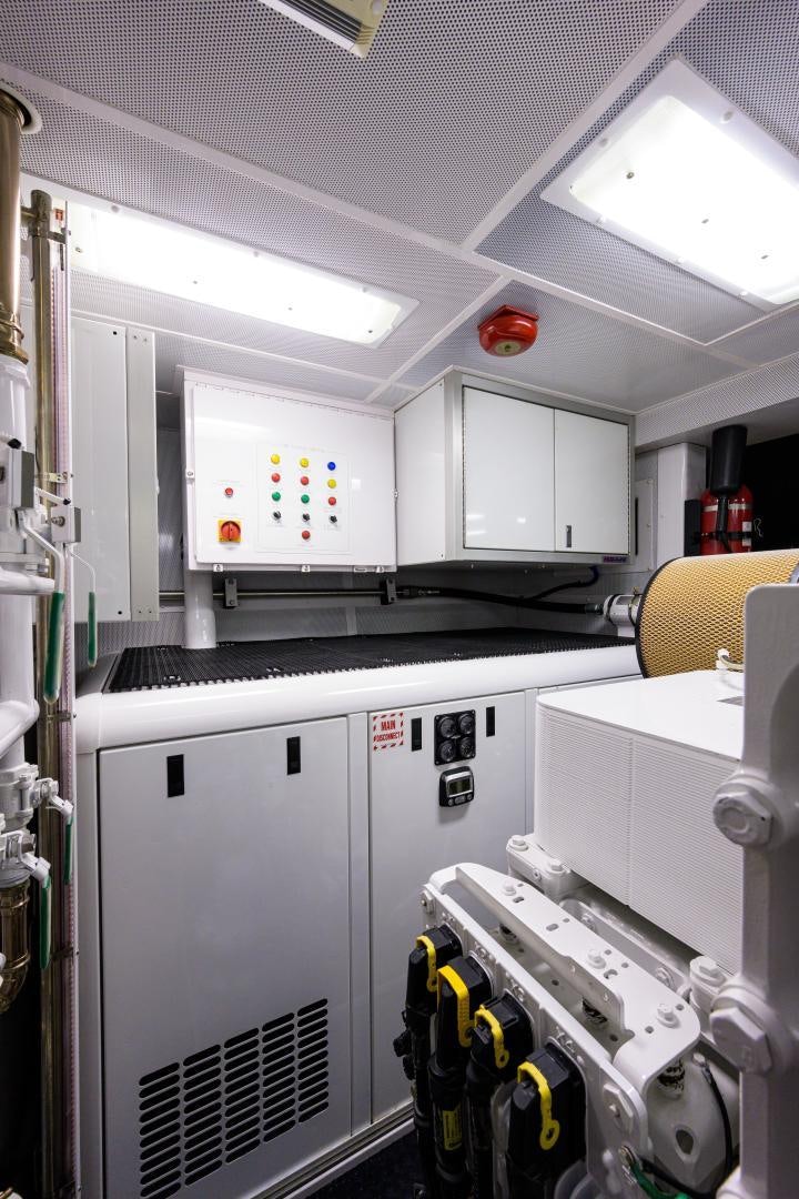 a kitchen with white cabinets aboard LADY JJ Yacht for Sale