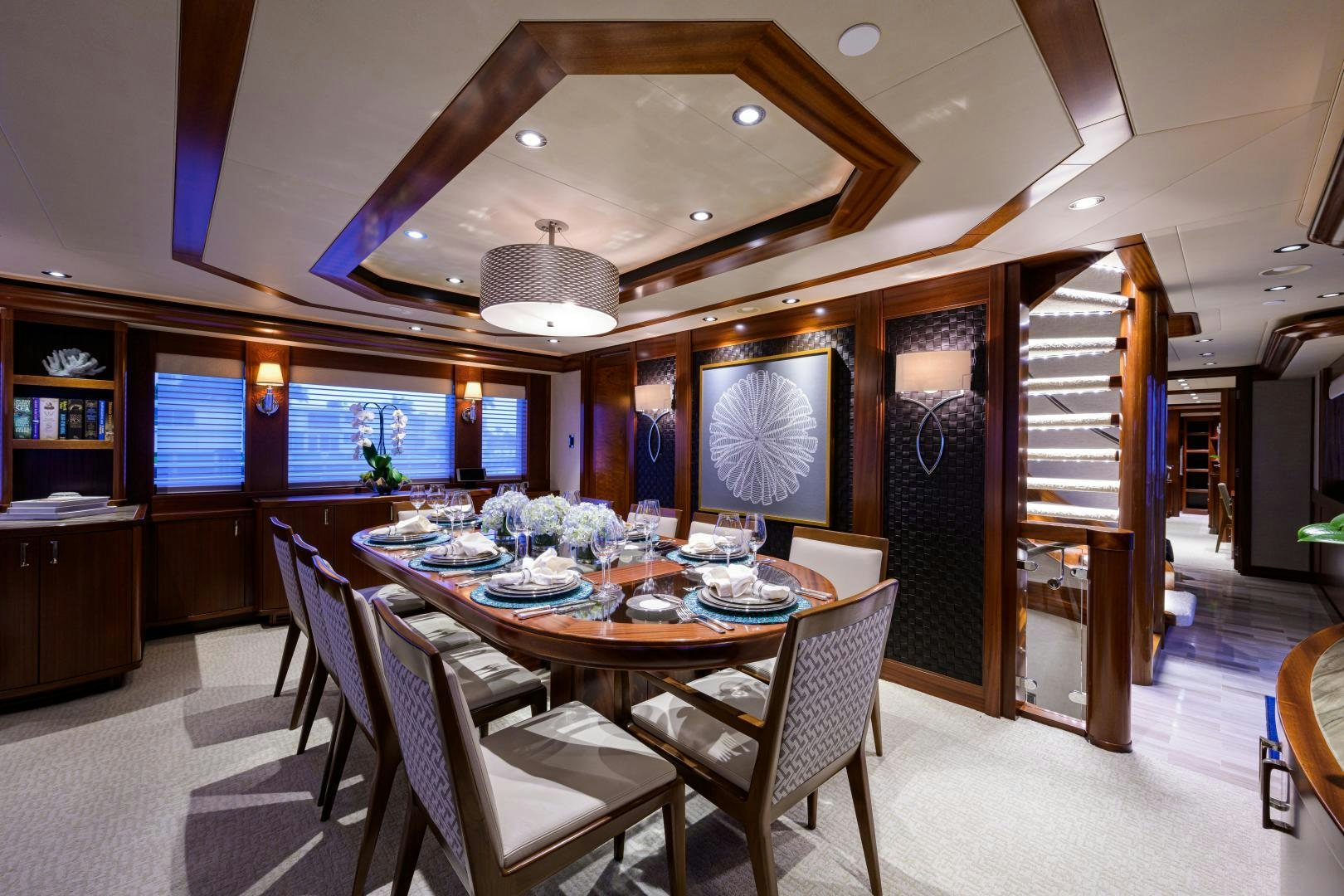 a dining room with a table and chairs aboard LADY JJ Yacht for Sale