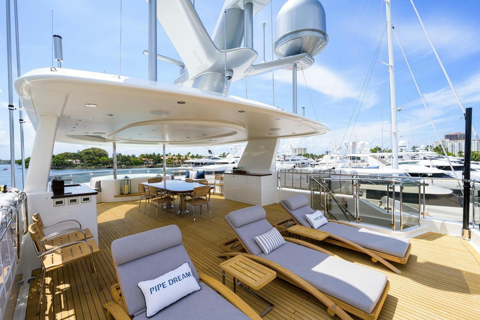 a large white airplane on display aboard LADY JJ Yacht for Sale