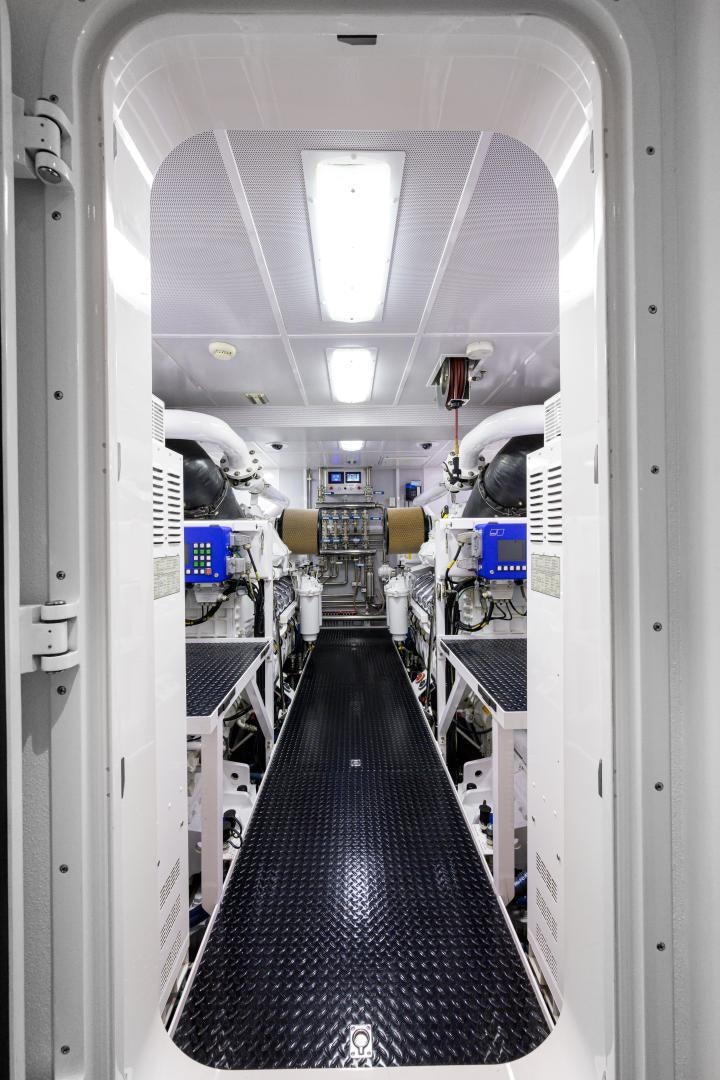 a hallway with a few machines aboard LADY JJ Yacht for Sale