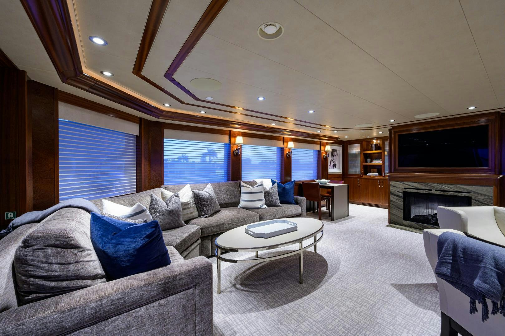 a living room with a large window aboard LADY JJ Yacht for Sale