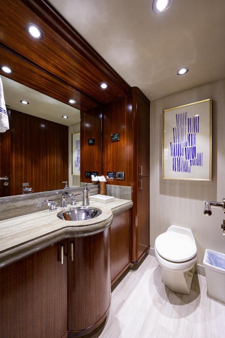 a bathroom with a sink and a toilet aboard LADY JJ Yacht for Sale