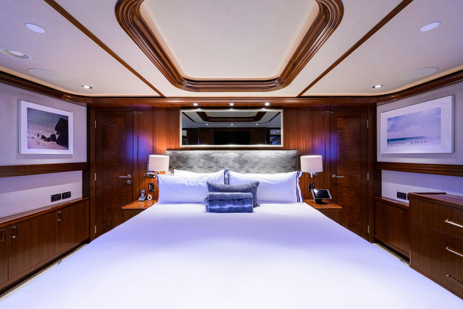 a bed with a white sheet aboard LADY JJ Yacht for Sale