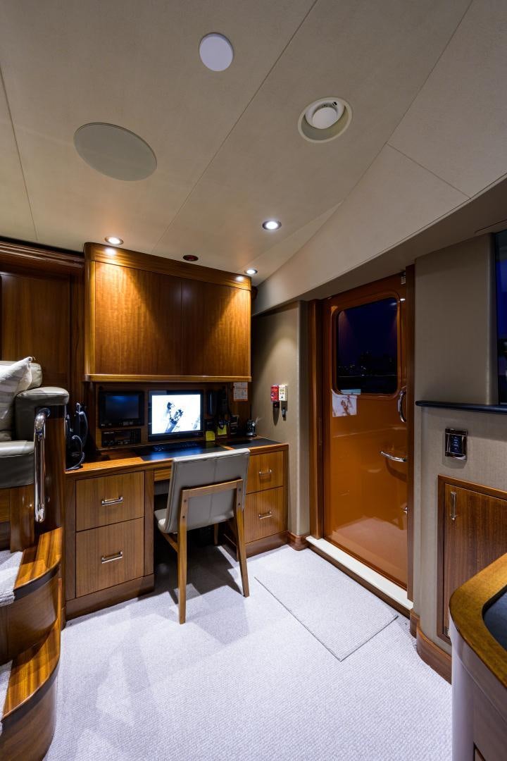 a kitchen with a large mirror aboard LADY JJ Yacht for Sale