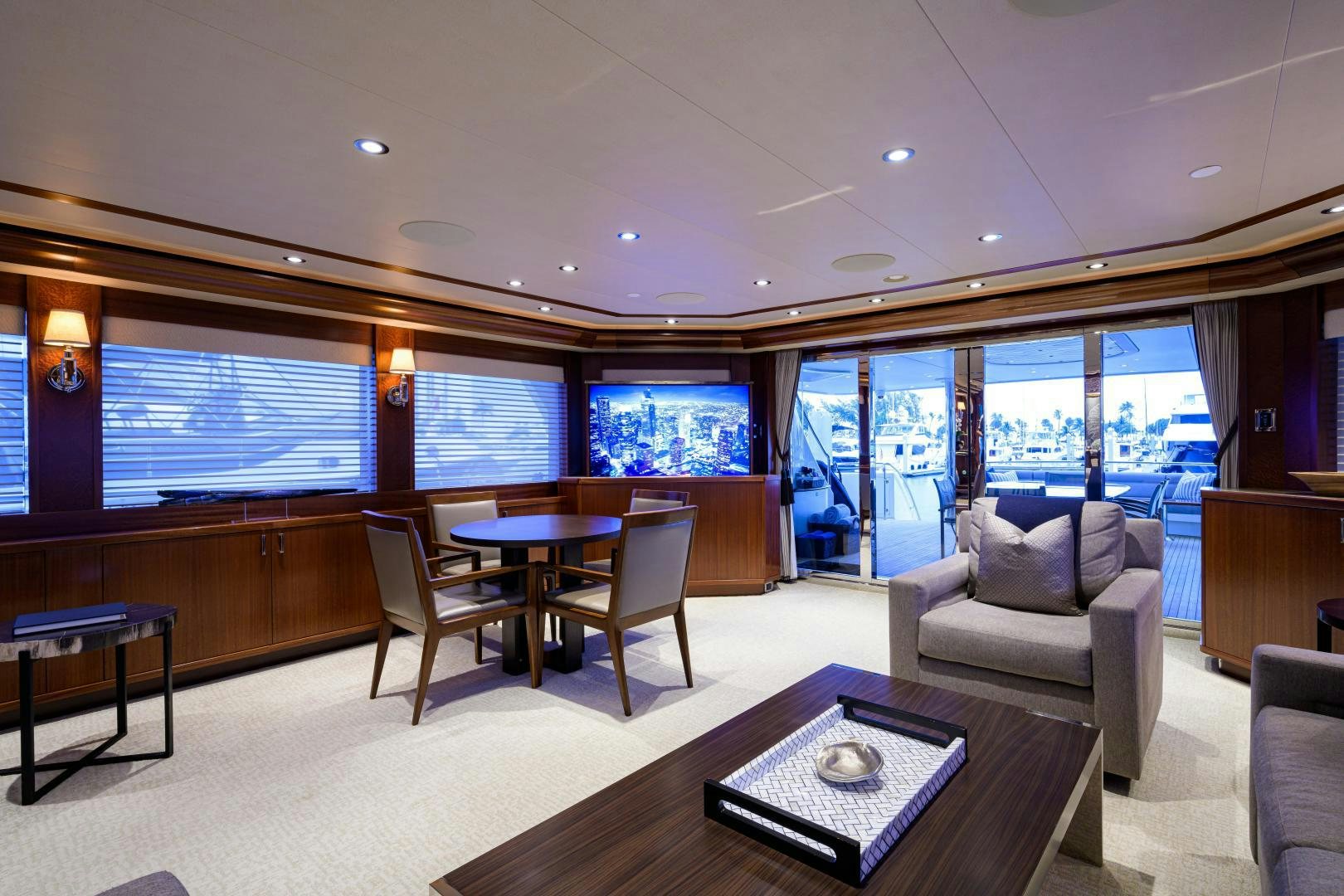 a living room with a large window aboard LADY JJ Yacht for Sale