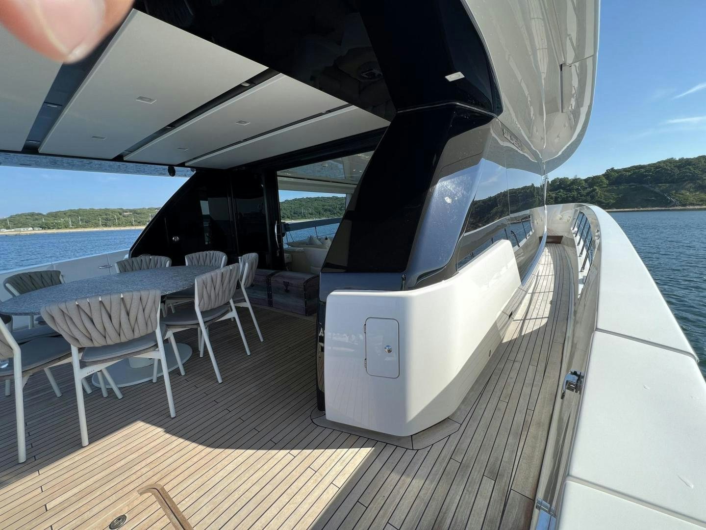 a boat on a deck aboard Twenty One Yacht for Sale