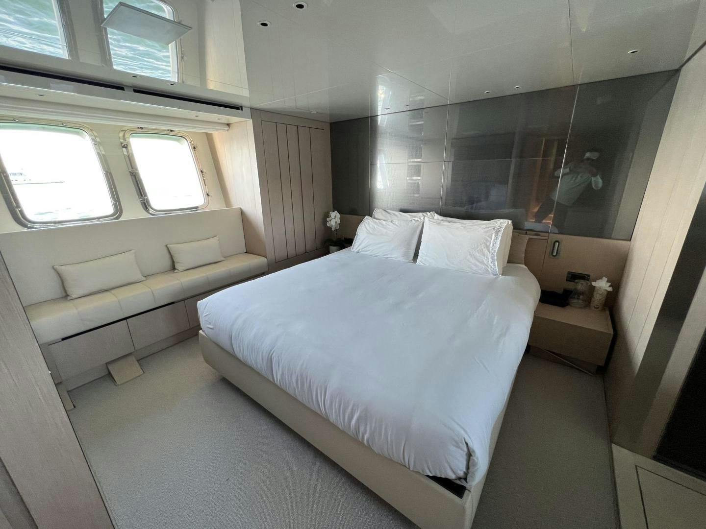 a room with a bed and a couch aboard Twenty One Yacht for Sale