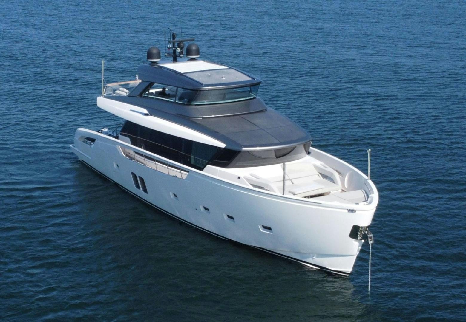 a white boat in the water aboard Twenty One Yacht for Sale