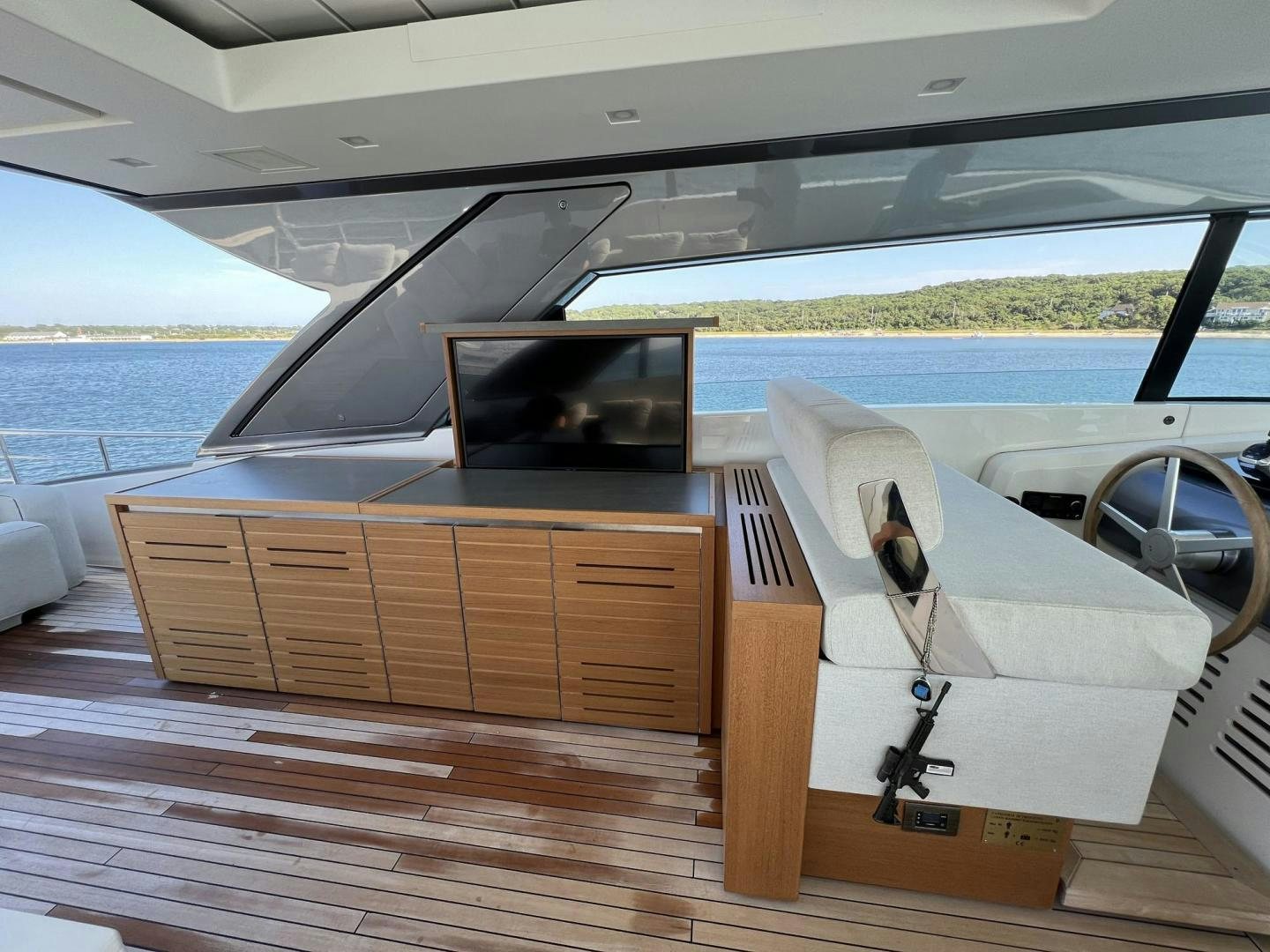 a boat on a deck aboard Twenty One Yacht for Sale