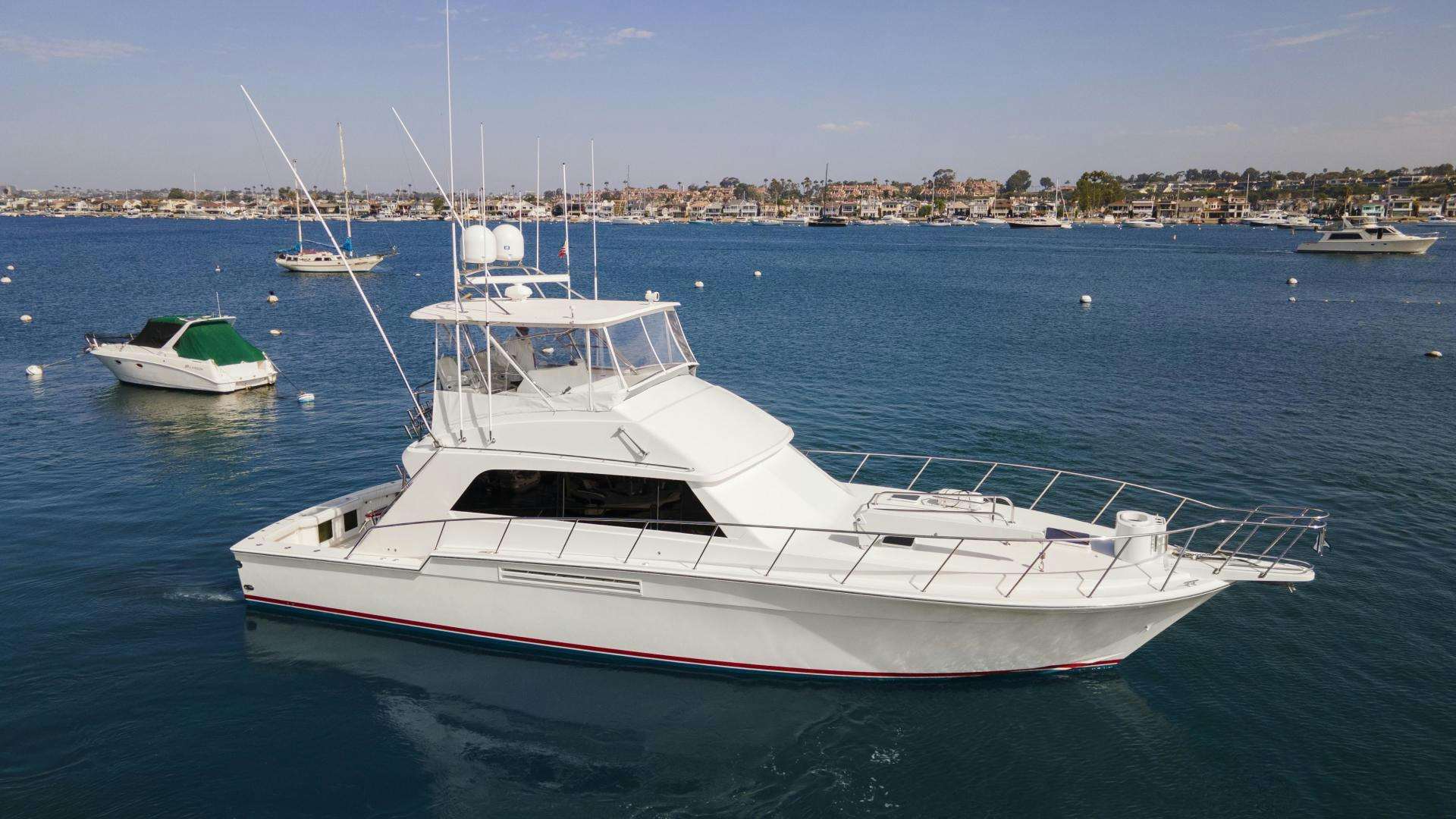 a large white boat in the water aboard PACIFIC PIONEER Yacht for Sale