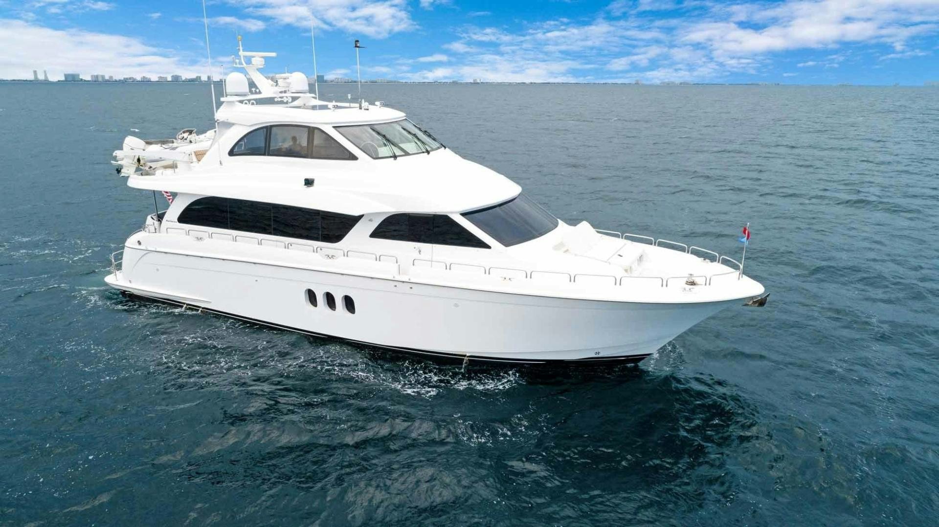a white yacht in the water aboard SEMPER FI Yacht for Sale