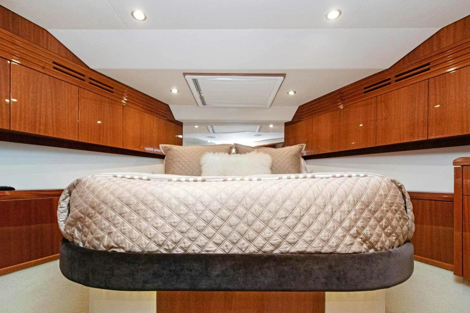 a bed in a room aboard SEMPER FI Yacht for Sale