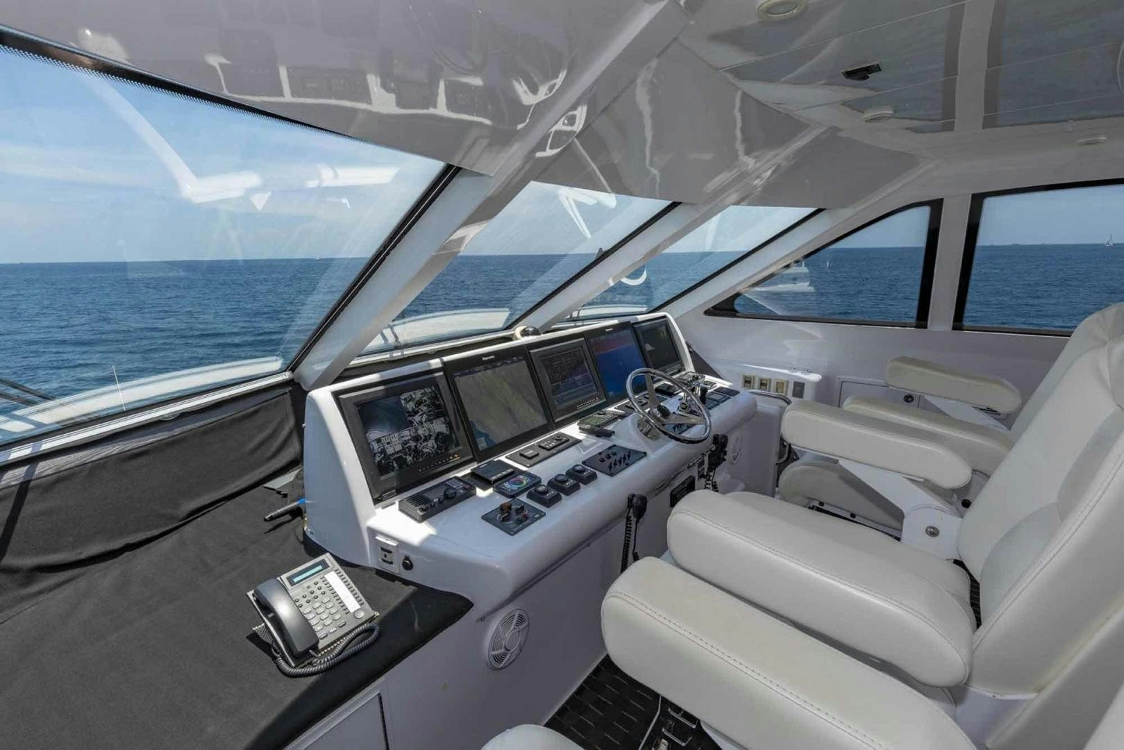inside of a car aboard SEMPER FI Yacht for Sale