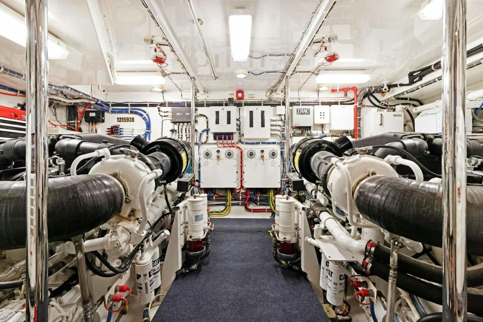 a room with pipes and machinery aboard SEMPER FI Yacht for Sale
