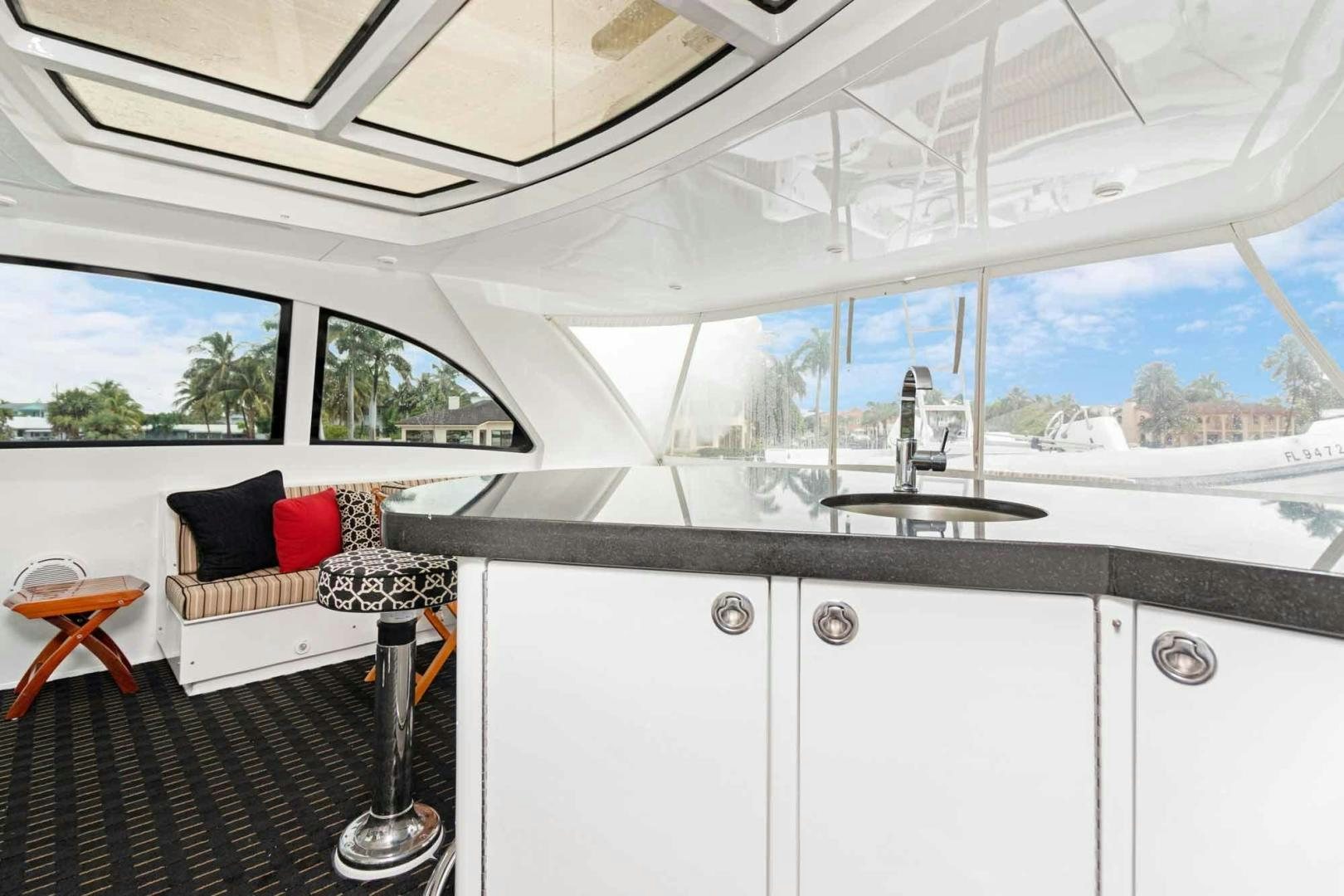 a kitchen with a sink and a window aboard SEMPER FI Yacht for Sale