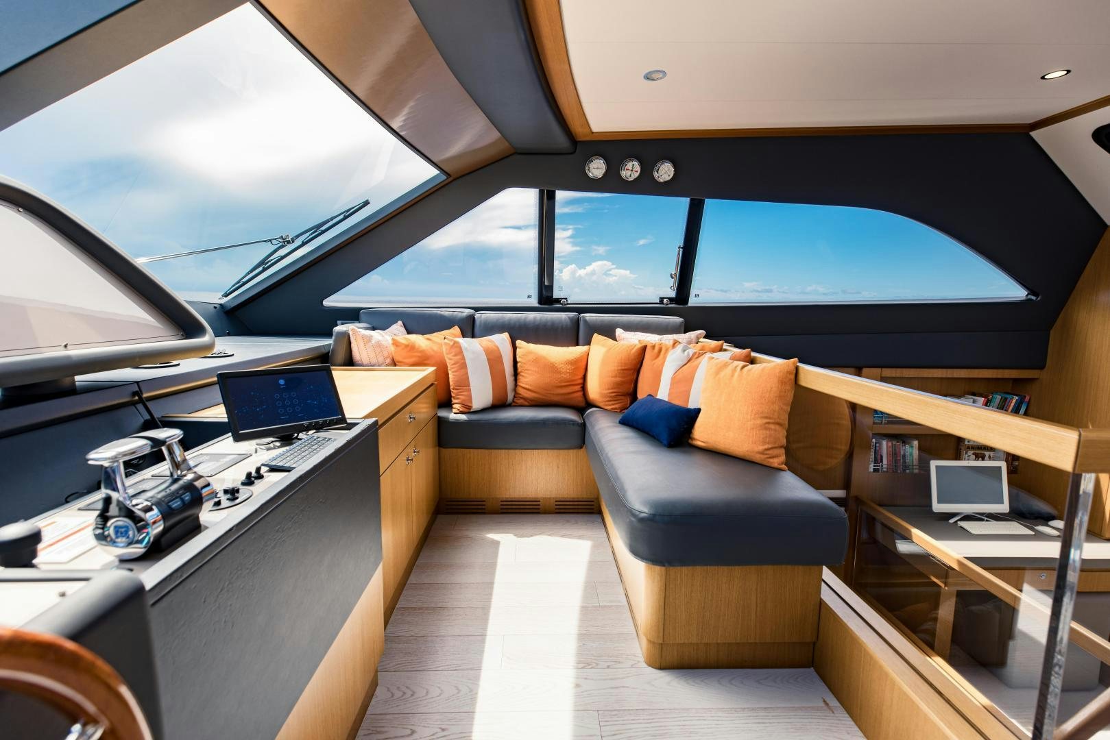 a room with a couch and a laptop aboard SHE RUNS WET Yacht for Sale