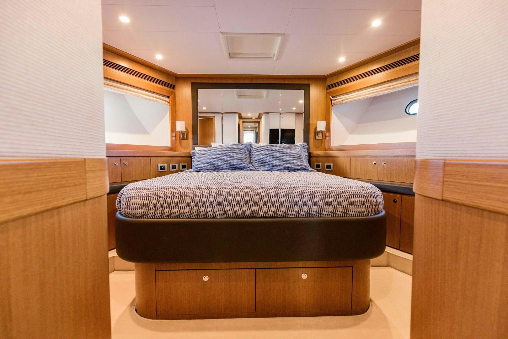 a bedroom with a bed aboard SHE RUNS WET Yacht for Sale