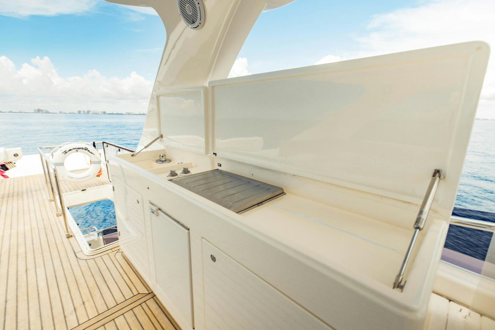 a boat on a deck aboard SHE RUNS WET Yacht for Sale