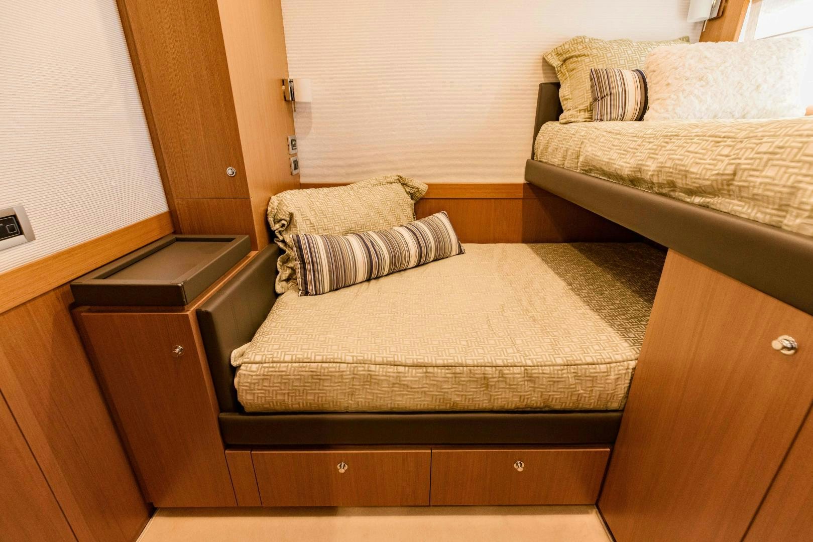 a couple of beds in a room aboard SHE RUNS WET Yacht for Sale