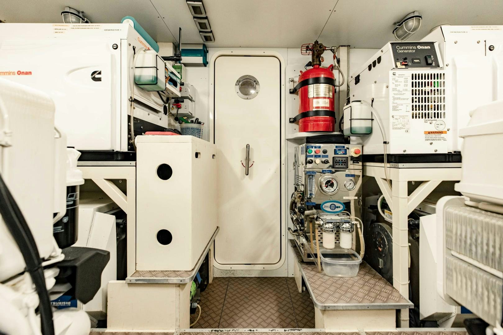 a room with several machines aboard SHE RUNS WET Yacht for Sale