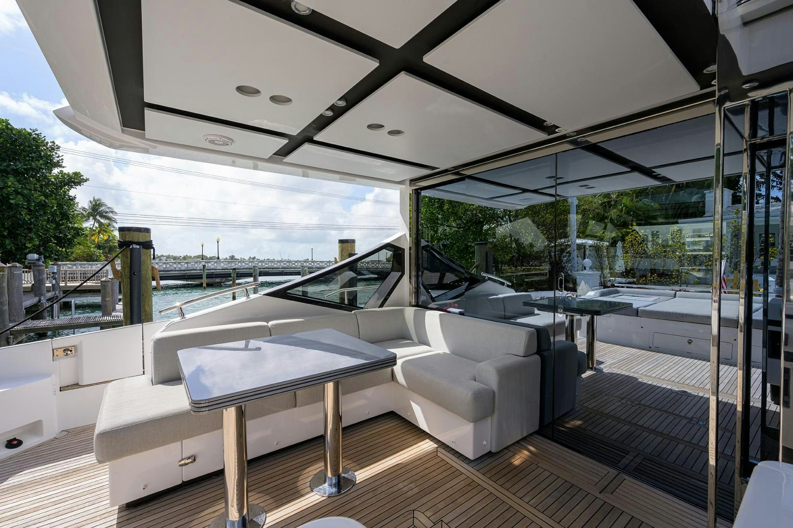 a room with a couch and a pool table aboard CRIMSON Yacht for Sale