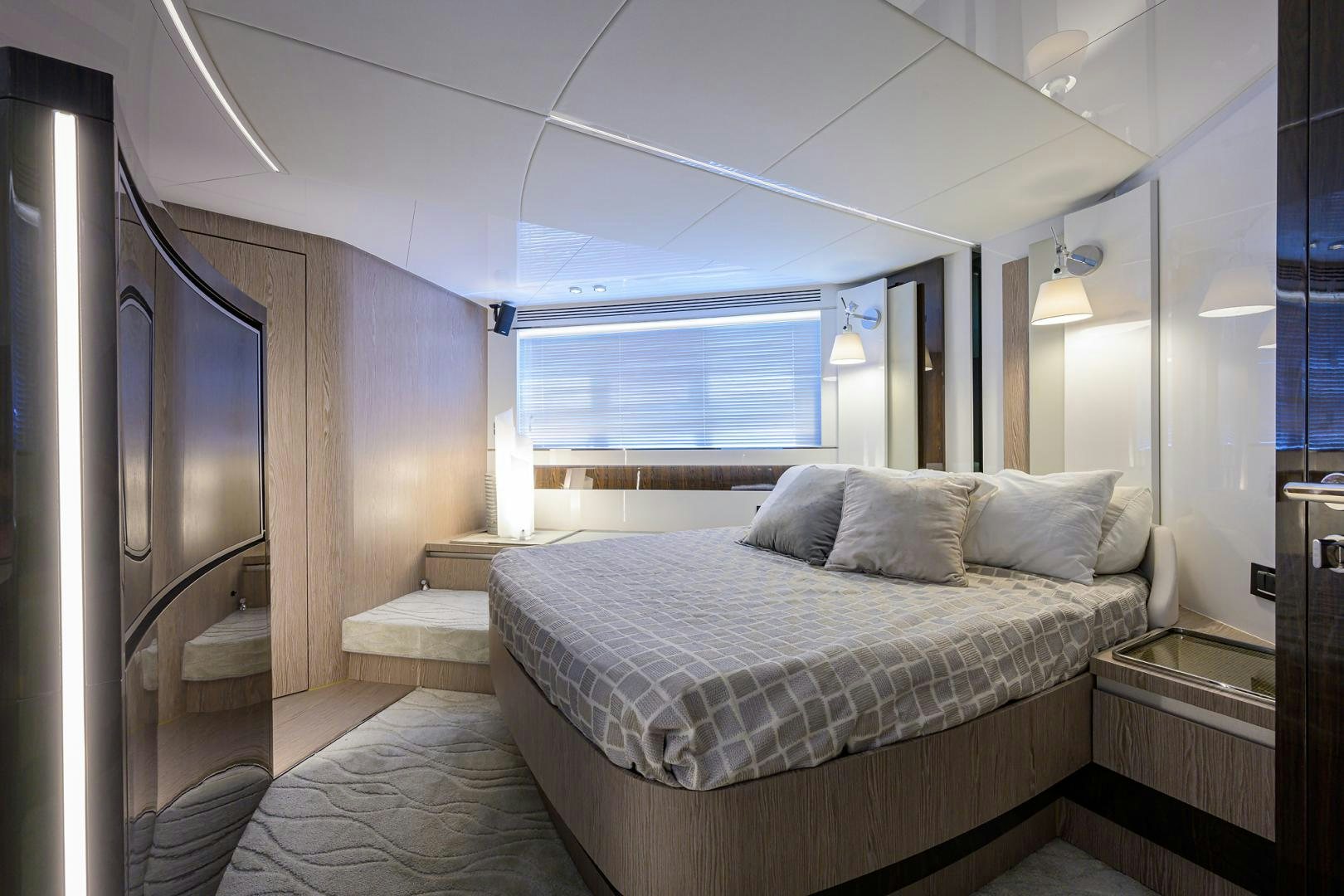 a bed in a room aboard CRIMSON Yacht for Sale