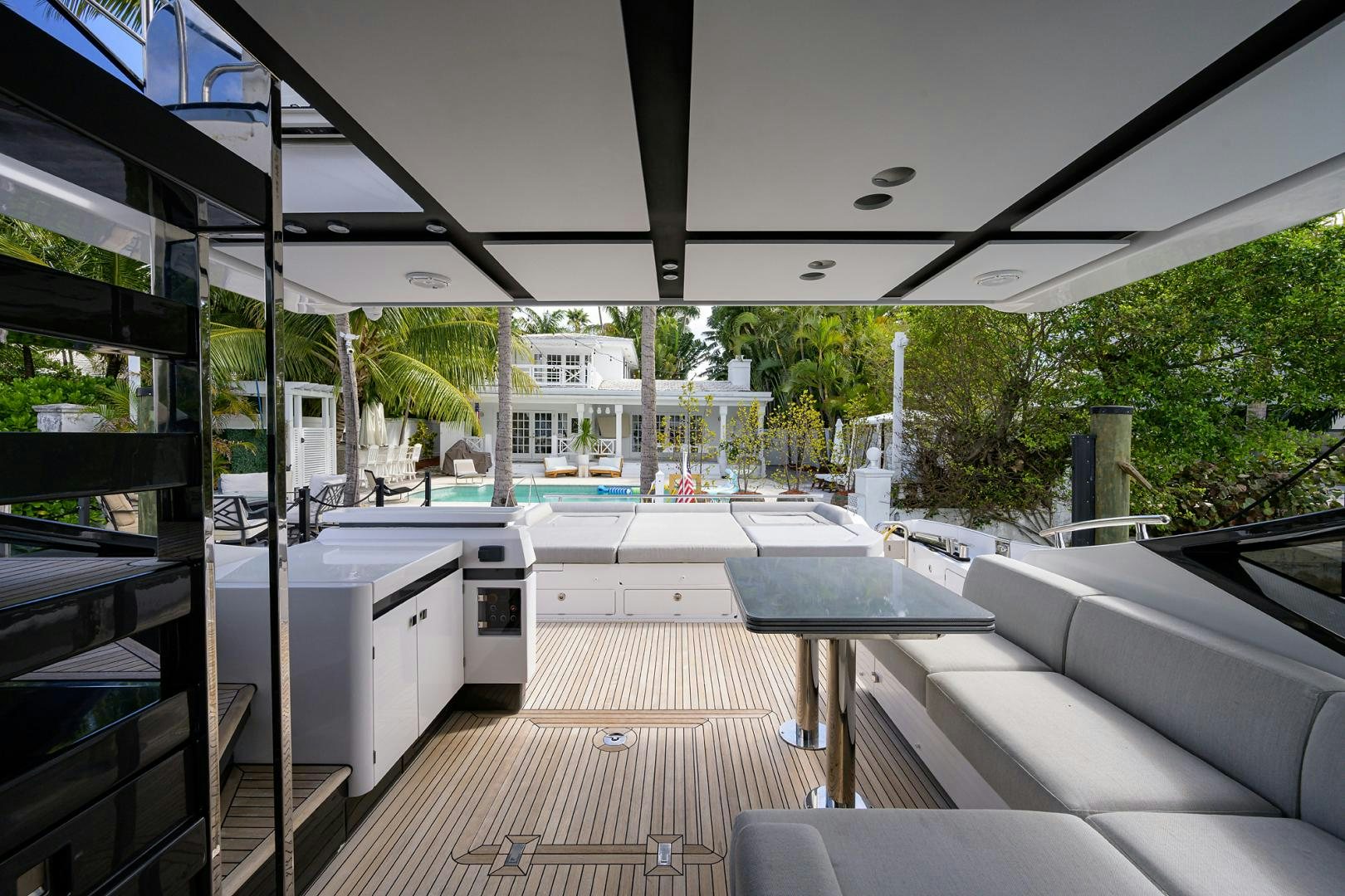 a deck with a pool and a deck aboard CRIMSON Yacht for Sale