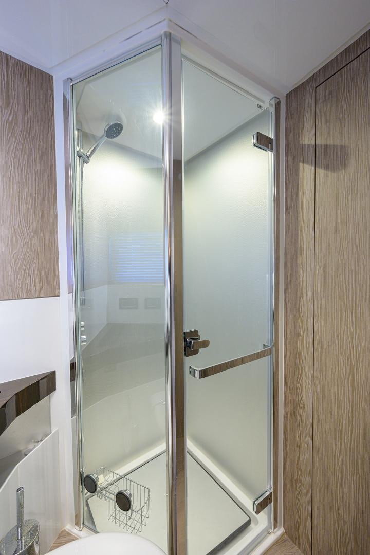 a shower unit in a bathroom aboard CRIMSON Yacht for Sale