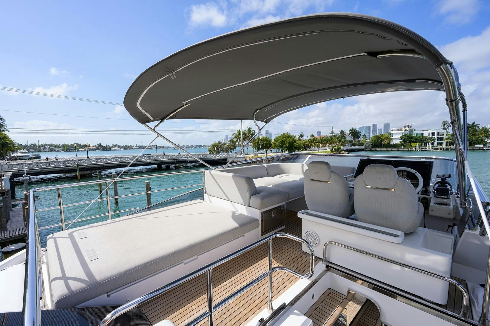 a boat with a chair on the deck aboard CRIMSON Yacht for Sale