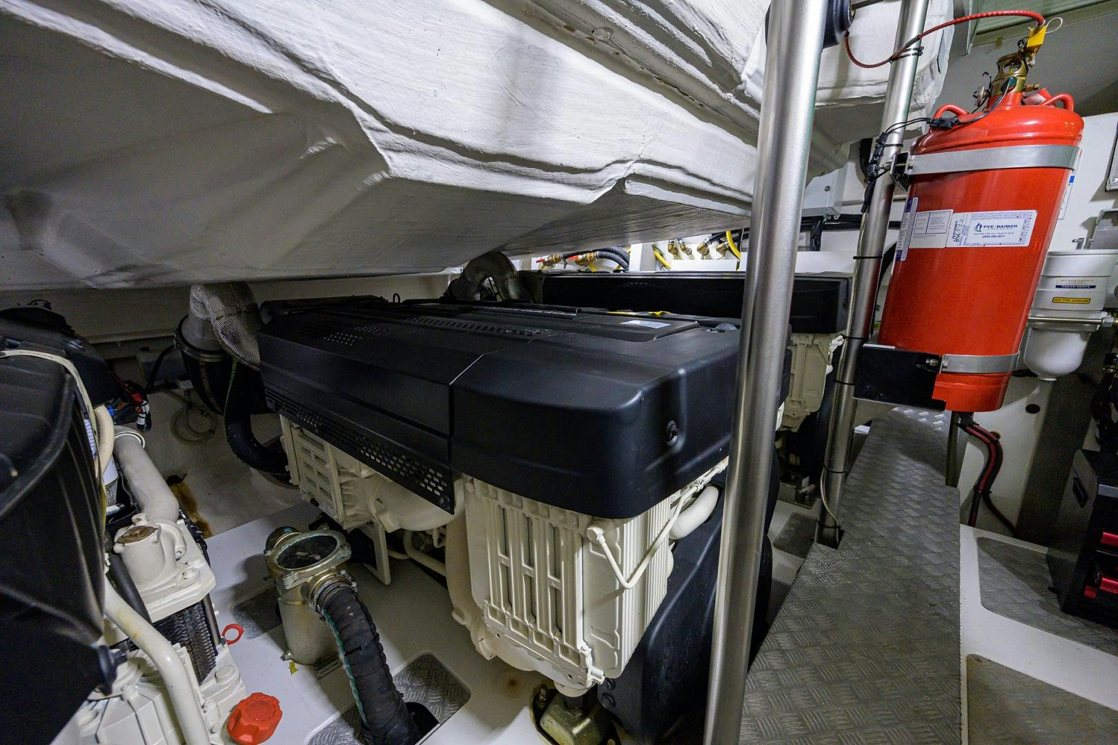 a machine with a red and white cap aboard CRIMSON Yacht for Sale