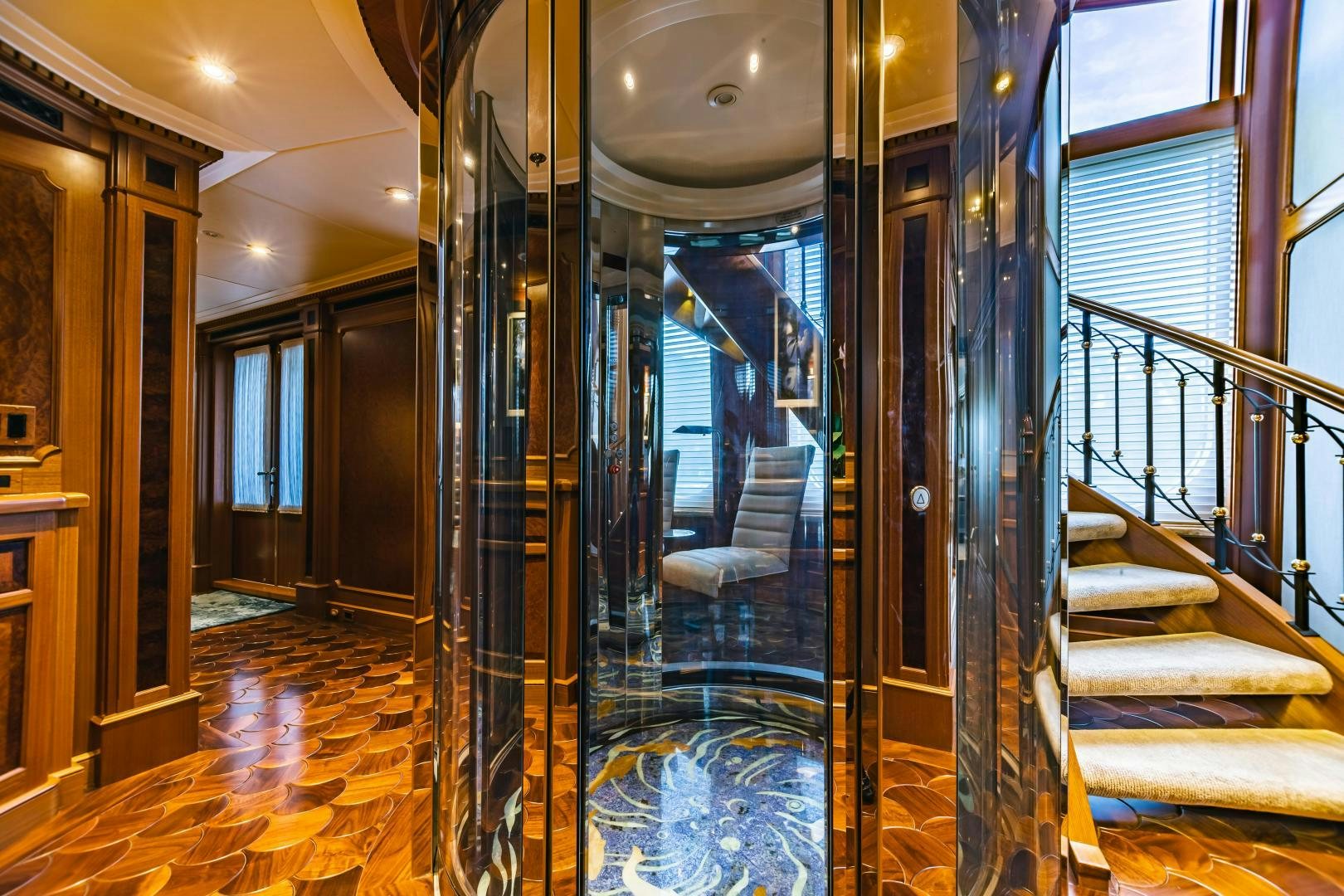 a hallway with glass doors aboard GALLANT LADY Yacht for Sale