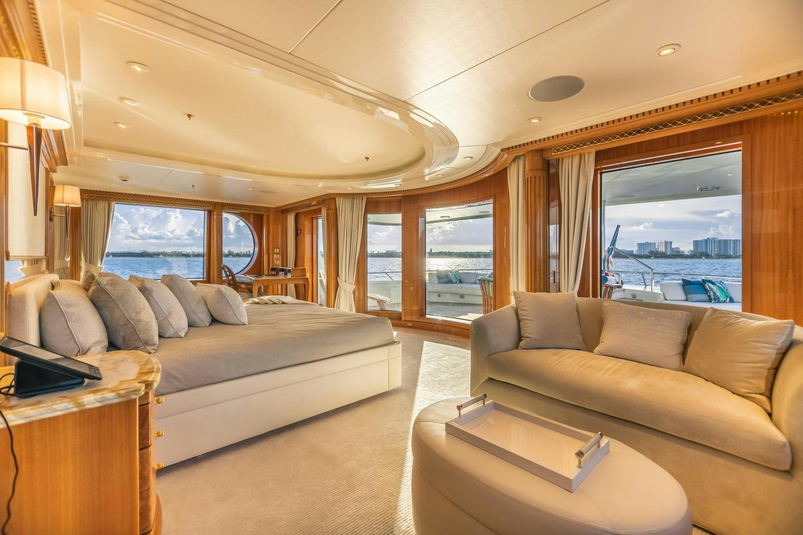 a bedroom with a bed and a couch aboard GALLANT LADY Yacht for Sale