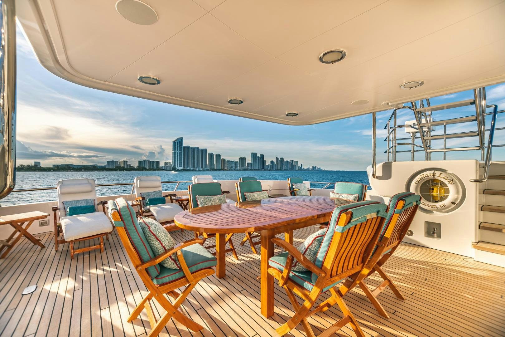 a deck with a view of the city and water aboard GALLANT LADY Yacht for Sale