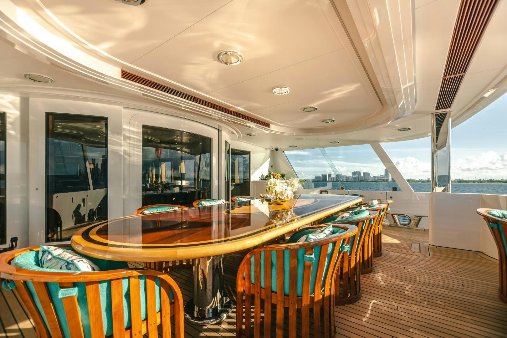 a room with a table and chairs aboard GALLANT LADY Yacht for Sale
