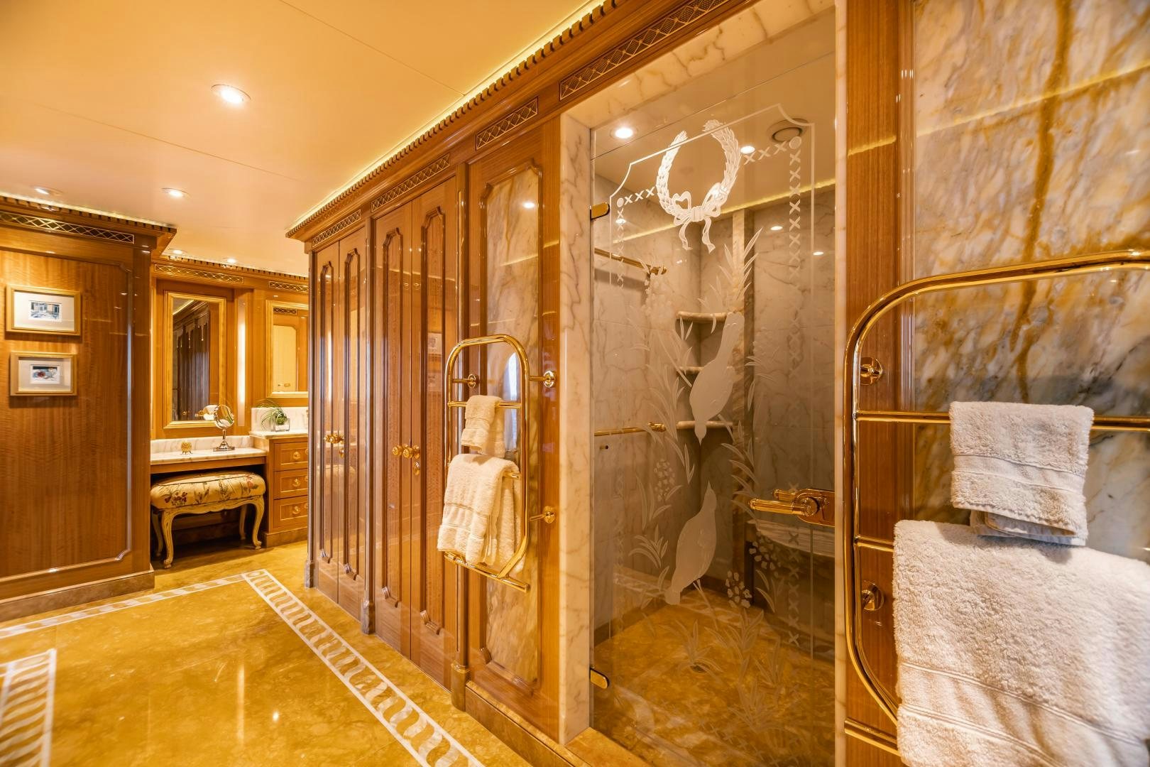 a bathroom with a shower and a sink aboard GALLANT LADY Yacht for Sale
