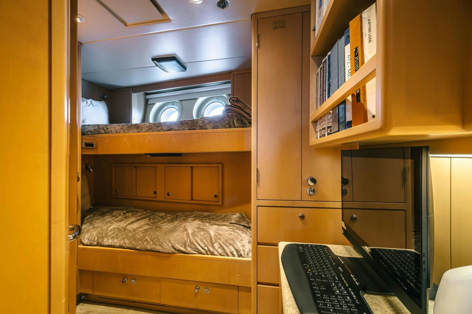 a room with a desk and a computer aboard GALLANT LADY Yacht for Sale