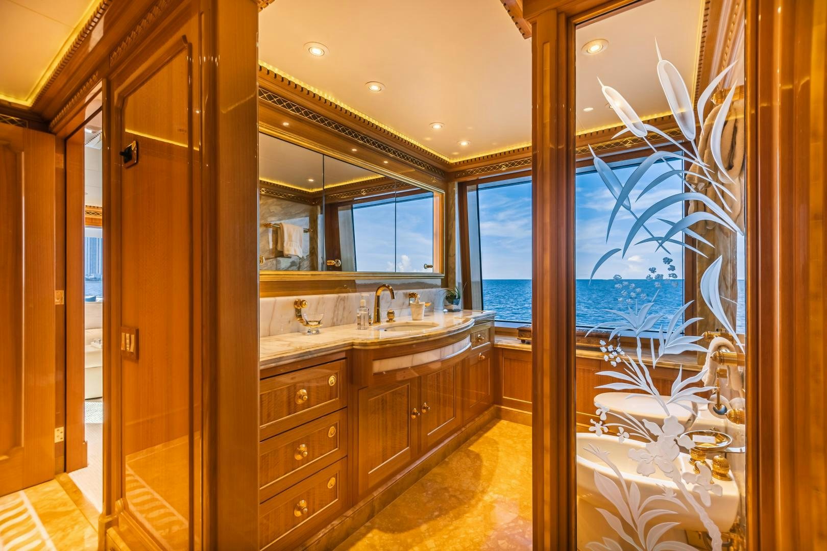 a bathroom with a large window aboard GALLANT LADY Yacht for Sale