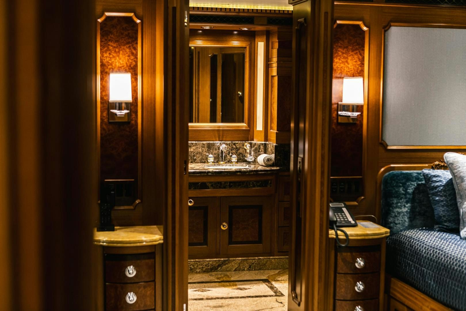 a bathroom with a sink and a mirror aboard GALLANT LADY Yacht for Sale