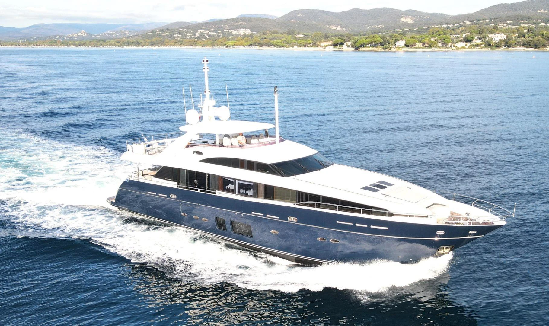 a large white ship aboard M/Y FLY Yacht for Sale